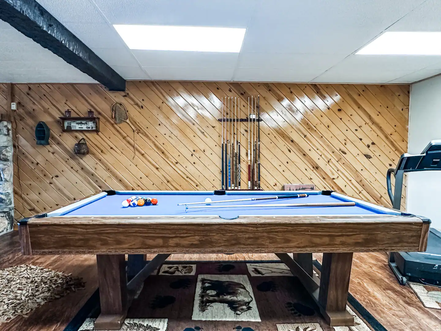 billiards room in a cabin basement